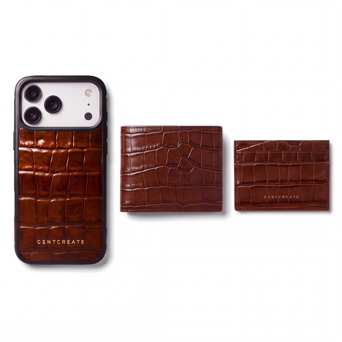 A brown crocodile-embossed GENTCREATE iPhone case, wallet and card holder side by side on white