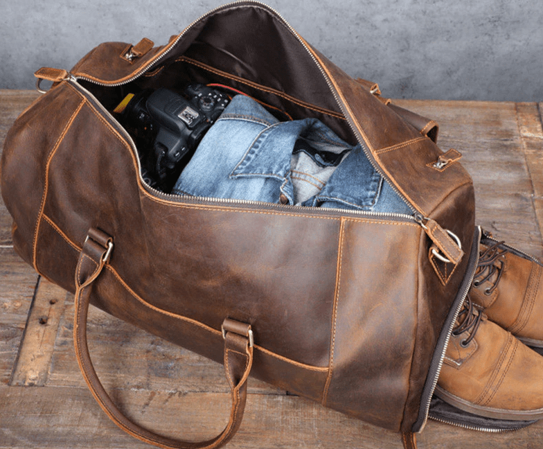 Crossbody-veske i brunt skinn Opes Brun lærcrossbody-veske "Opes" - GENTCREATE