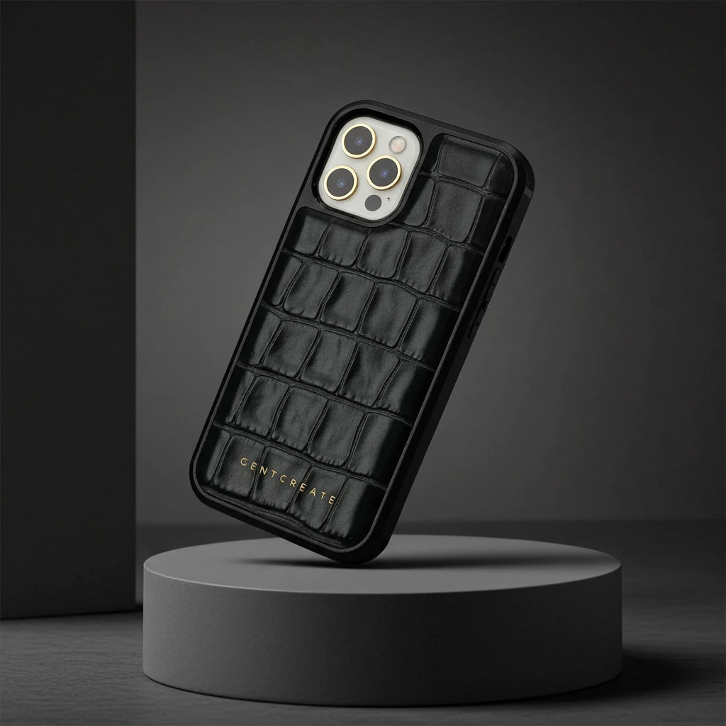 Black crocodile-patterned phone case on a gray background