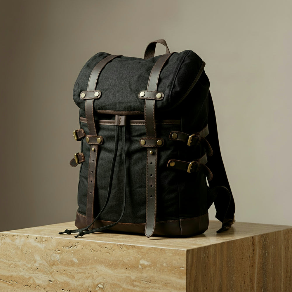 Black canvas leather backpack with leather straps