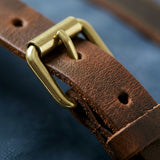 Macro photography of blue canvas retro backpack by GENTCREATE