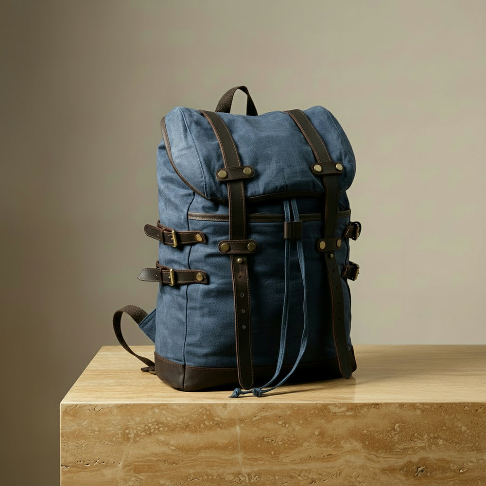 Navy blue hiking backpack with brown straps by GENTCREATE