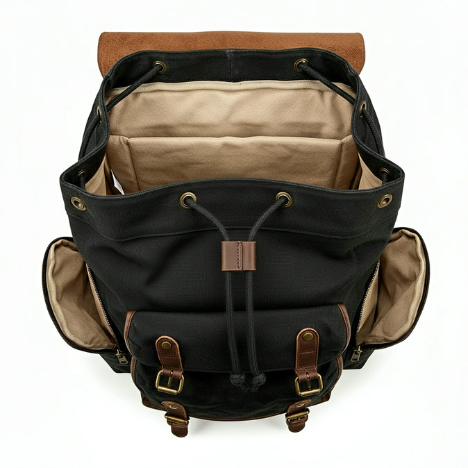 Black backpack with brown accents on a white background