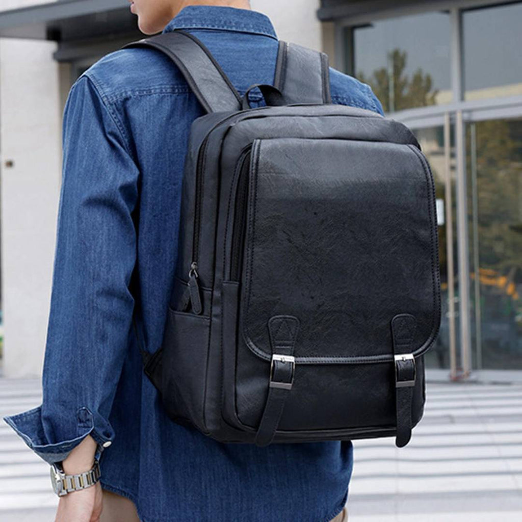 The man is carrying on his back a black leather backpack from the Gentcreate.