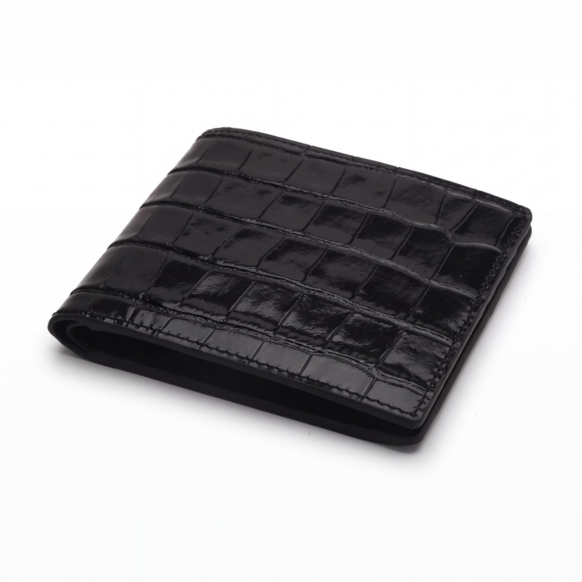 Portefeuille GENTCREATE à deux volets en cuir noir brillant embossé façon crocodile, fermé et posé à plat sur fond blanc