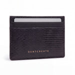 Black lizard-embossed leather business card holder by GENTCREATE standing on white