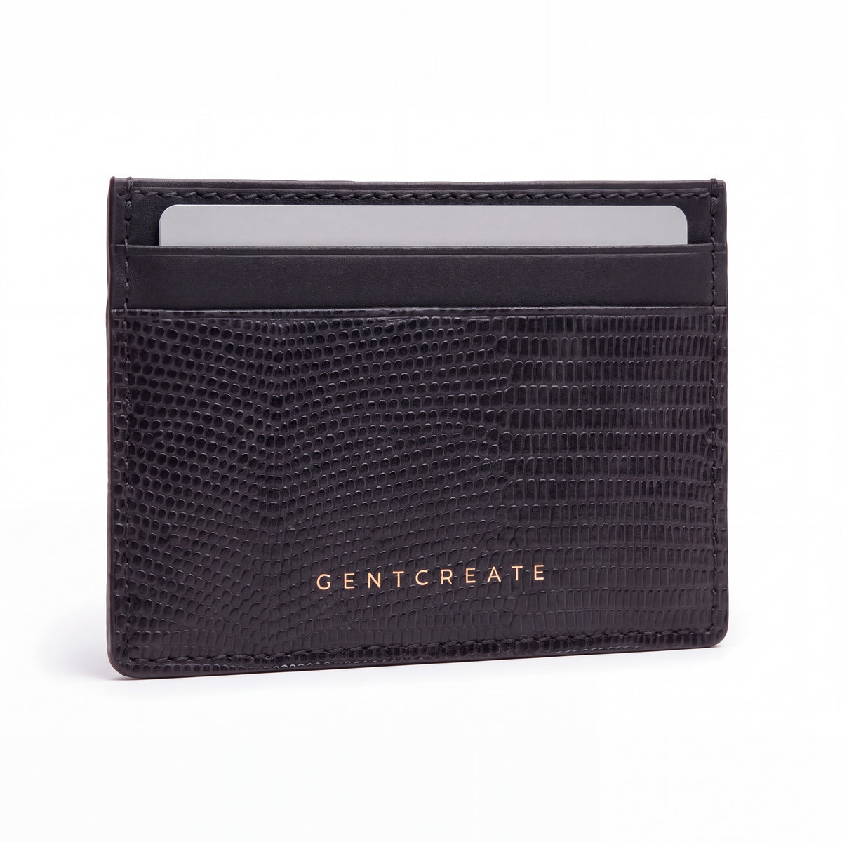 Black lizard-embossed leather business card holder by GENTCREATE standing on white