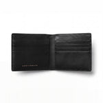 Portefeuille GENTCREATE à deux volets en cuir bleu brillant embossé façon crocodile, ouvert sur les fentes pour cartes, sur fond blanc