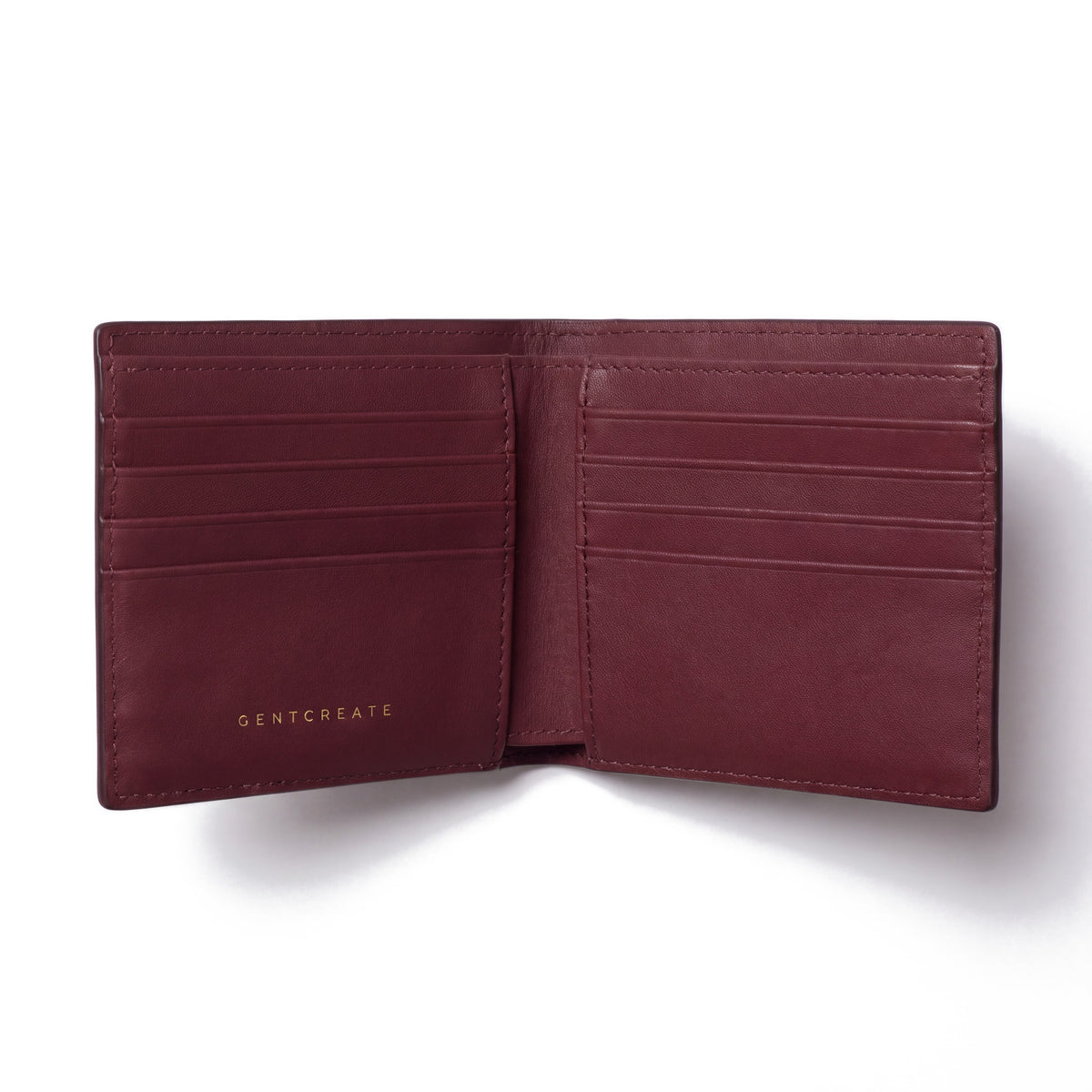 Open burgundy crocodile-embossed leather bifold wallet by GENTCREATE showing the card slots, on white