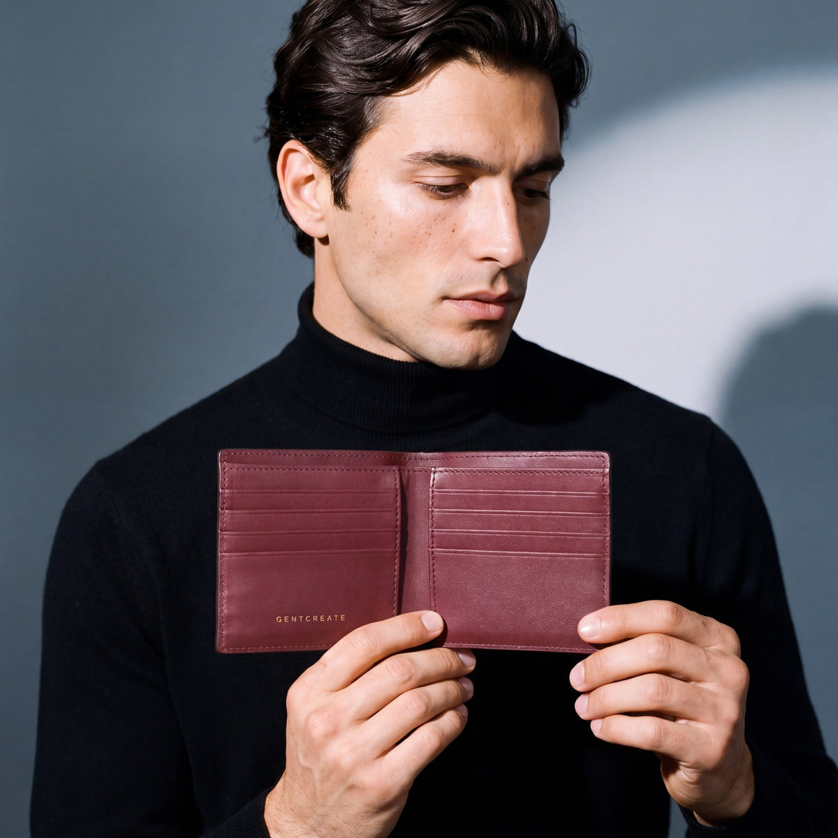 Man opening a burgundy crocodile-embossed leather bifold wallet by GENTCREATE to show the card slots