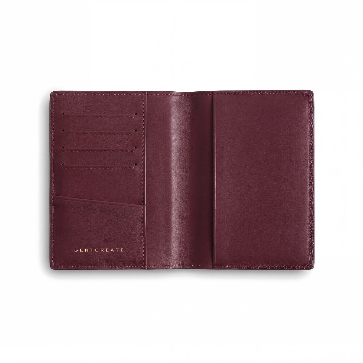 Open burgundy lizard-embossed leather passport holder by GENTCREATE showing the passport sleeve and card slots, on white