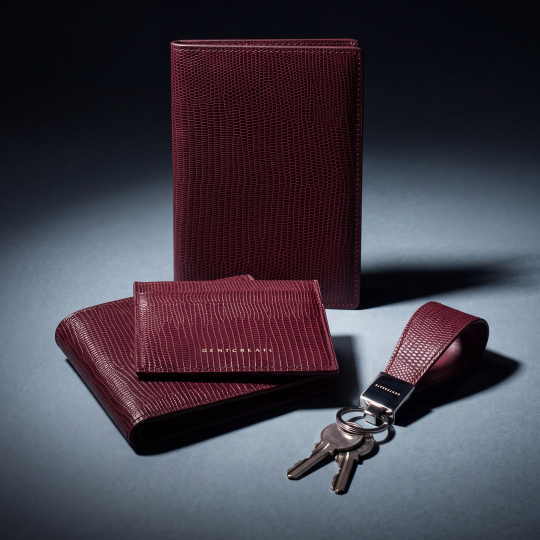 A burgundy lizard-embossed GENTCREATE passport holder, wallet, card holder and keychain with keys