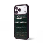 Green glossy crocodile-embossed calfskin iPhone 18 Pro case by GENTCREATE standing on white, its camera window in view