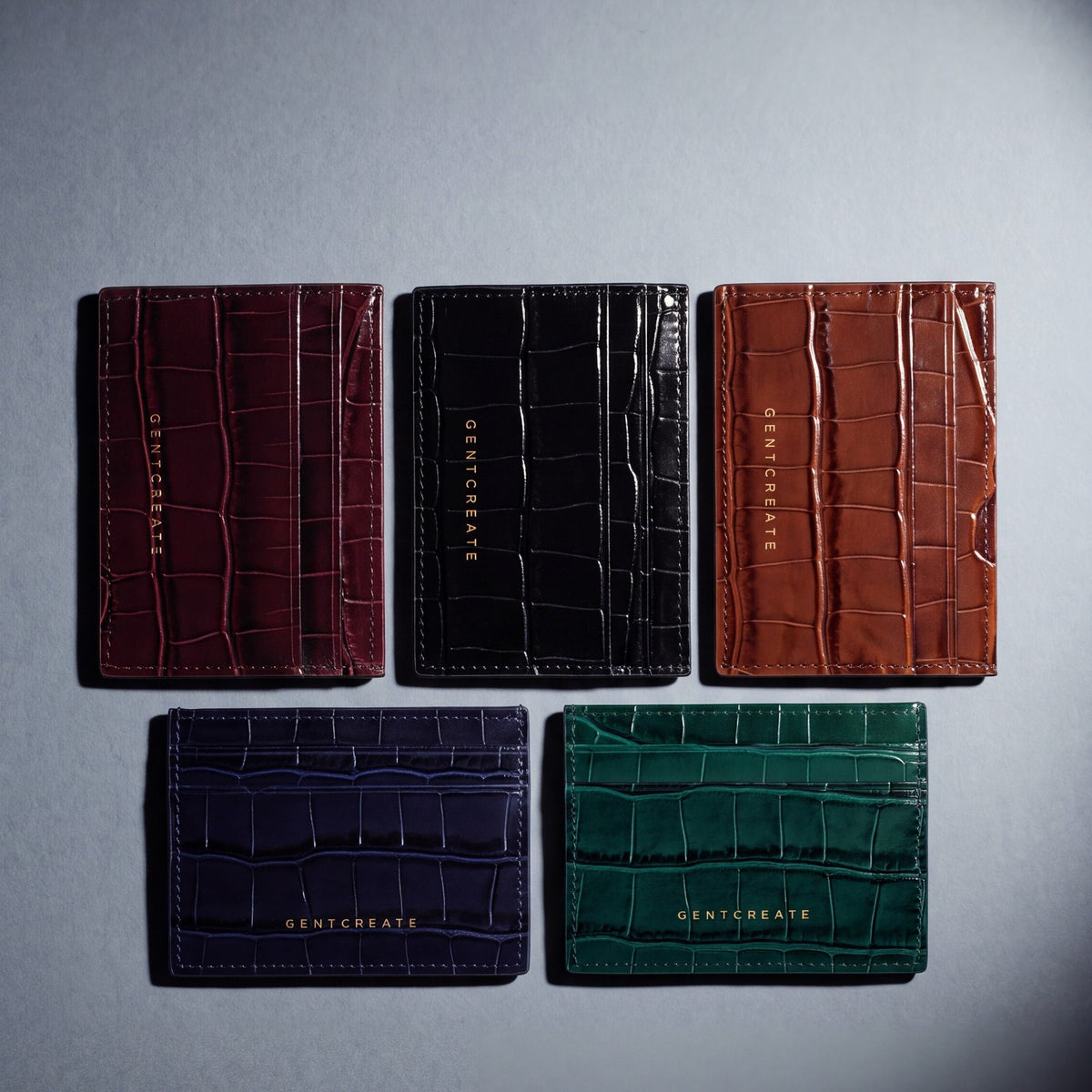 Crocodile-embossed leather card holder by GENTCREATE in burgundy, black, brown, navy and green, laid flat
