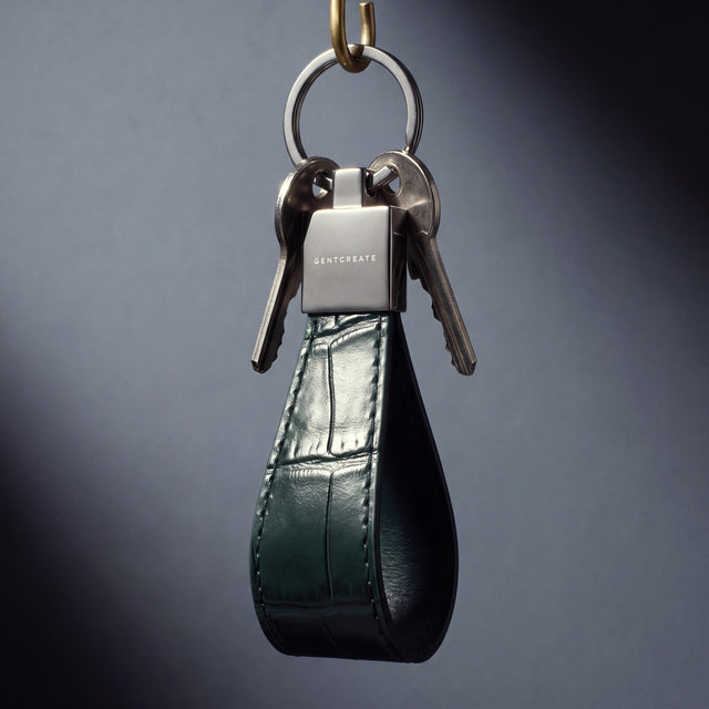 Green crocodile-embossed leather keychain by GENTCREATE, studio still life
