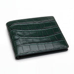 Portefeuille GENTCREATE à deux volets en cuir vert brillant embossé façon crocodile, fermé et posé à plat sur fond blanc