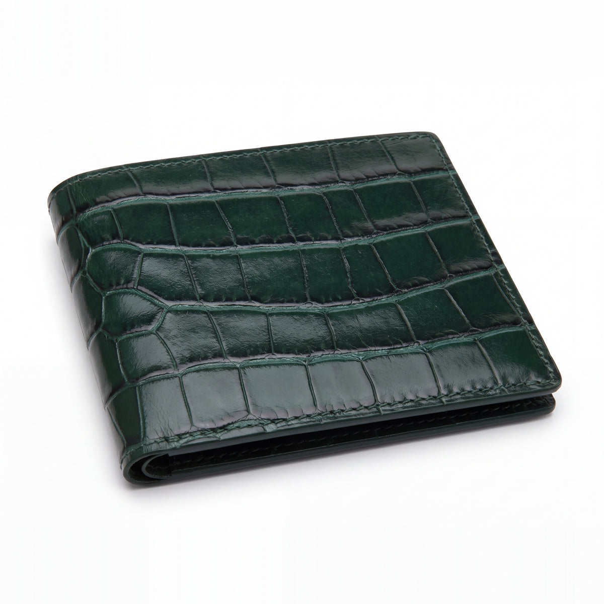 Portefeuille GENTCREATE à deux volets en cuir vert brillant embossé façon crocodile, fermé et posé à plat sur fond blanc