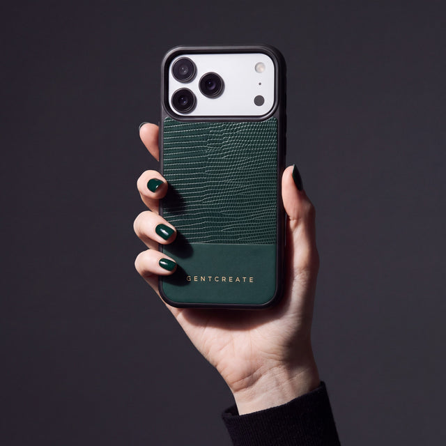 Hand with green nails holding a green lizard-embossed calfskin iPhone 18 Pro Max case by GENTCREATE