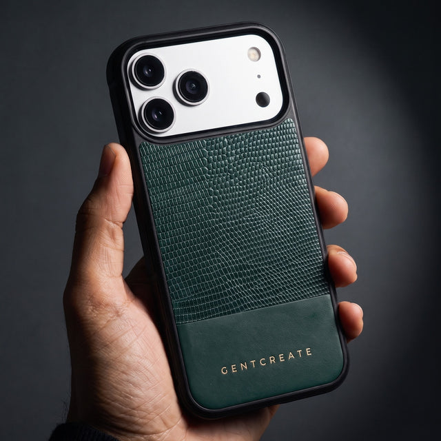 Hand holding a green lizard-embossed leather iPhone 18 Pro Max case by GENTCREATE in a single studio light