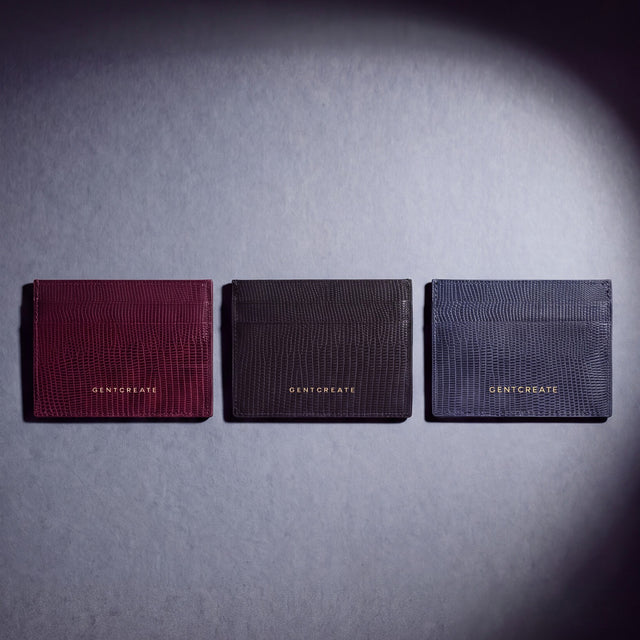 Lizard-embossed leather card holder by GENTCREATE in burgundy, black and navy, laid flat