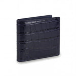 Closed navy crocodile-embossed leather bifold wallet by GENTCREATE standing on white