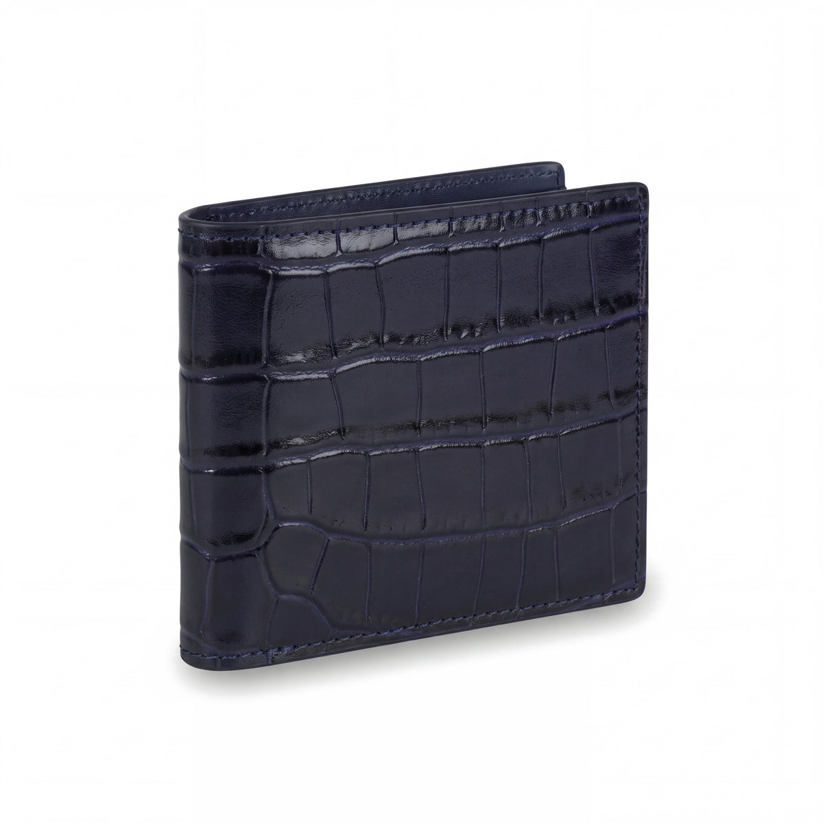 Closed navy crocodile-embossed leather bifold wallet by GENTCREATE standing on white