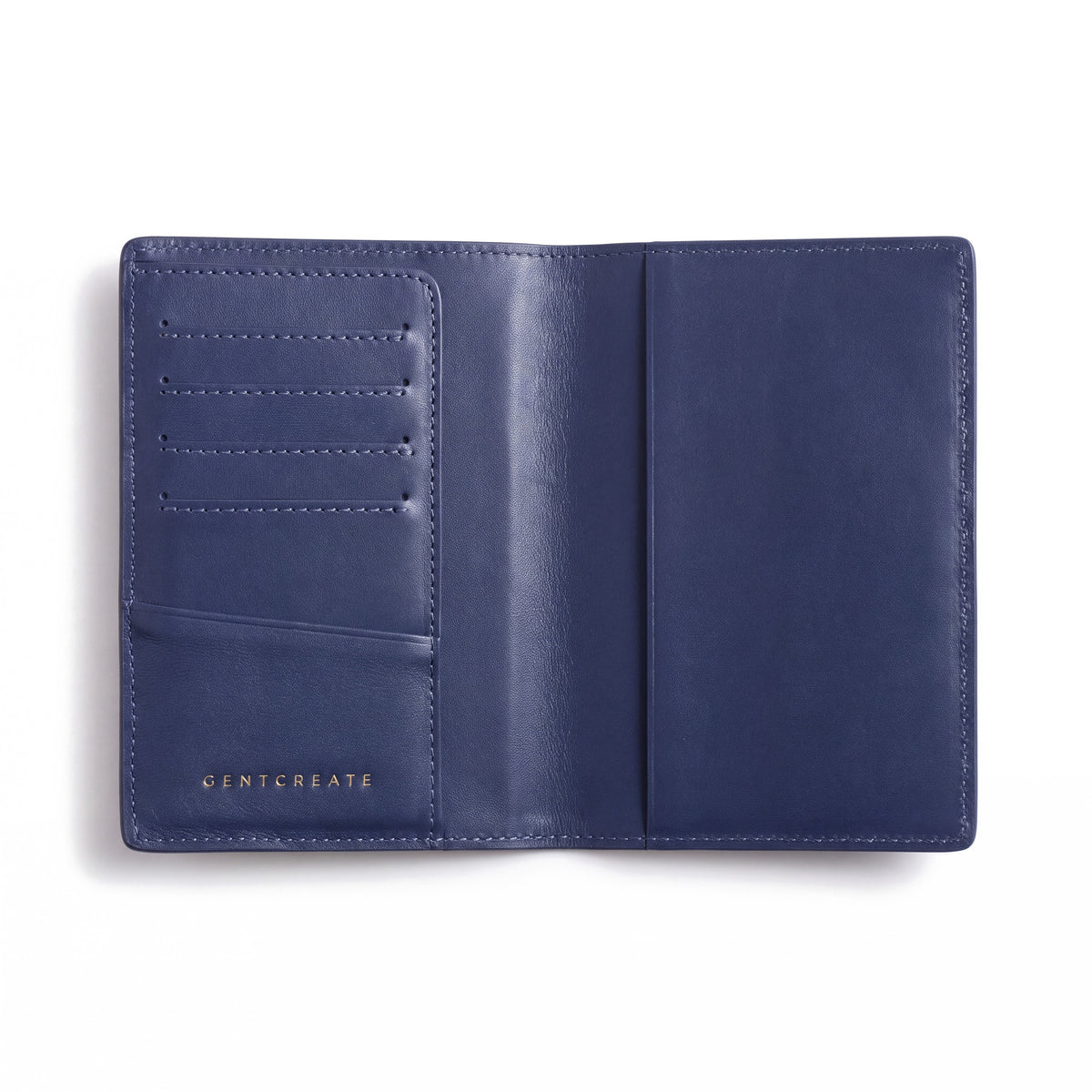 Open navy lizard-embossed leather passport holder by GENTCREATE showing the passport sleeve and card slots, on white