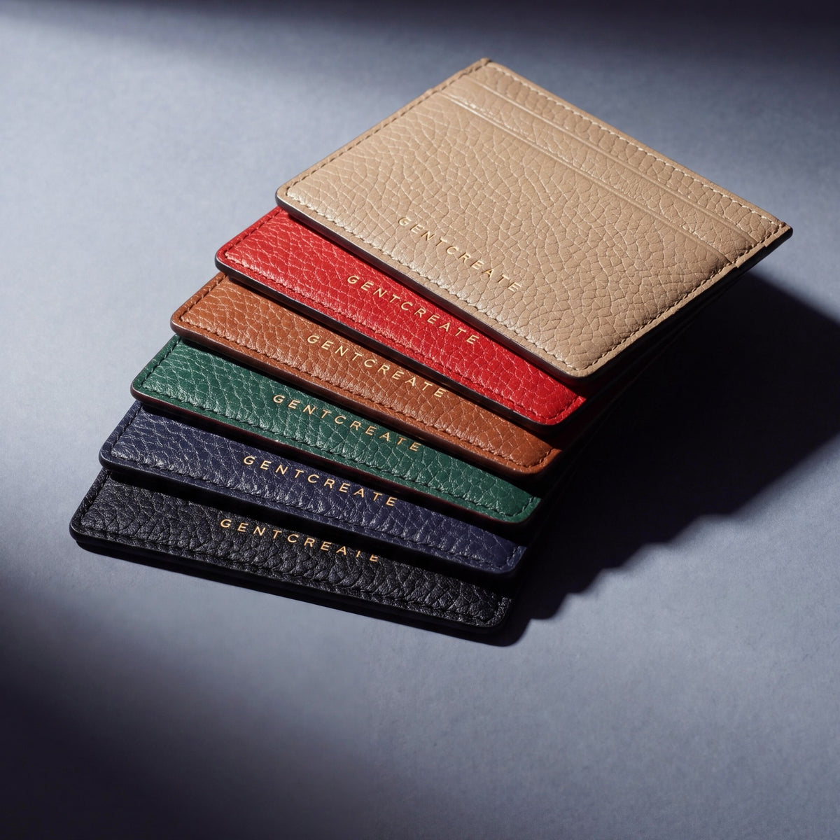 Pebble leather card holder by GENTCREATE in black, navy, green, brown, red and beige, stacked