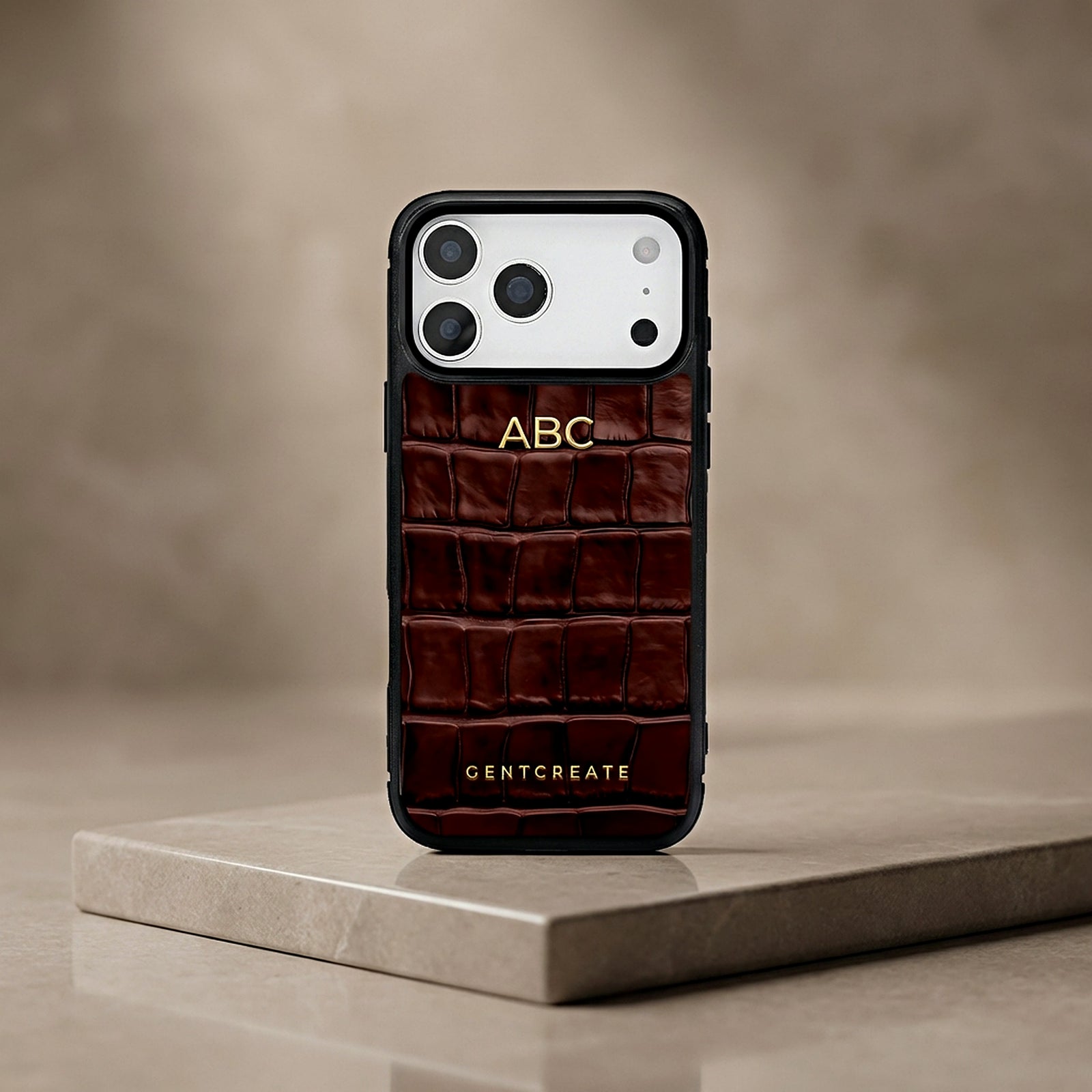 Handmade custom personalized initials leather iPhone 17 Pro max case in crocodile pattern in burgundy color by GENTCREATE close-up