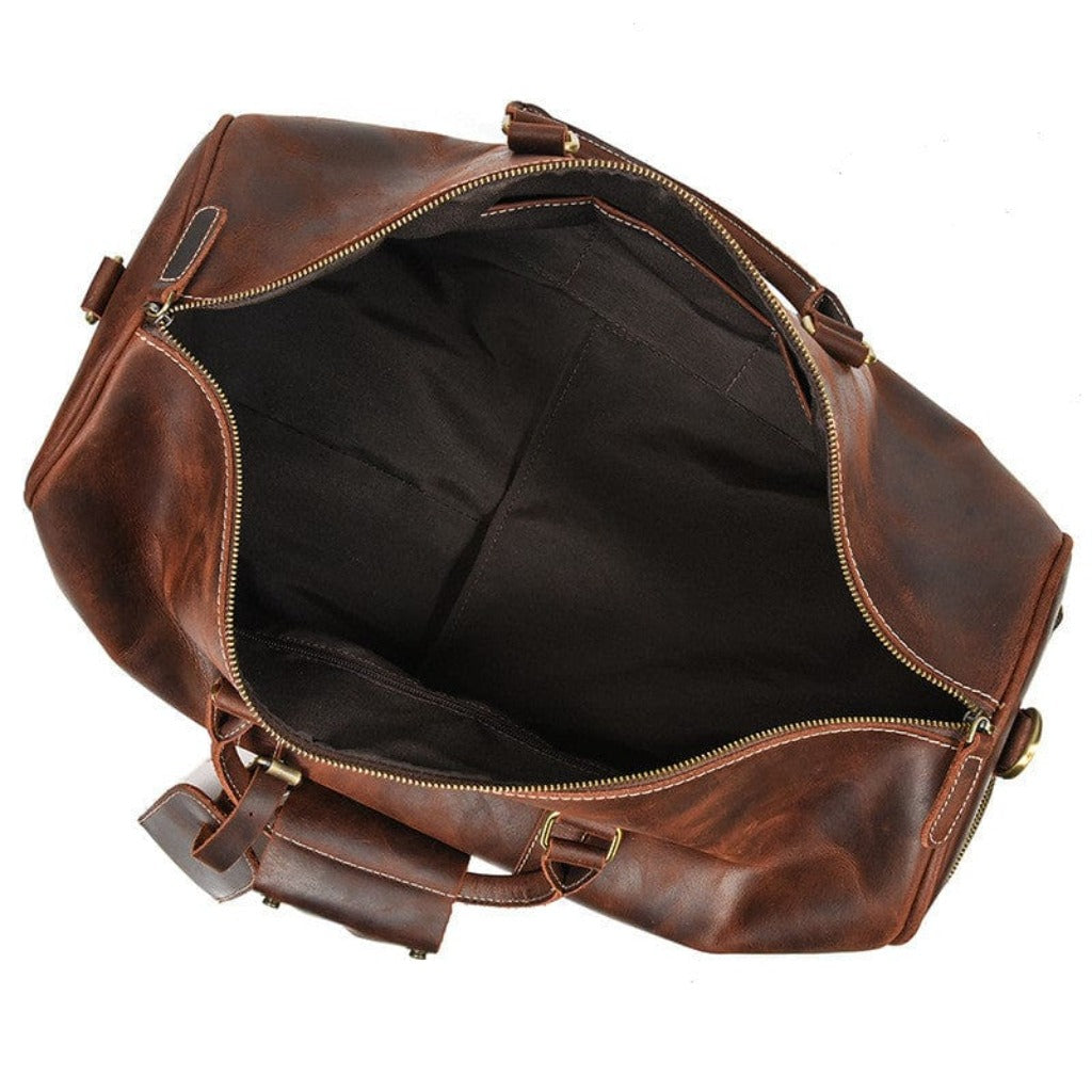 close up interior view of leather duffle bag