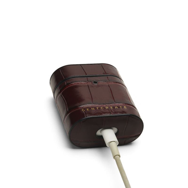जेंटक्रिएट द्वारा बरगंडी चमकदार चमड़े का एयरपॉड केस