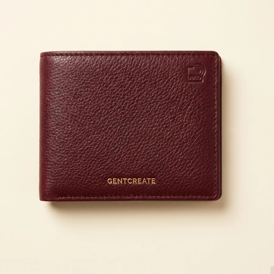 Carteira bifold em pele com bloqueio RFID, fechada, com o logótipo GENTCREATE a dourado